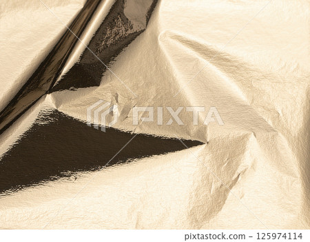 Gold foil texture with a crinkled, shiny surface. Elegant vintage metallic material with a sleek, 125974114