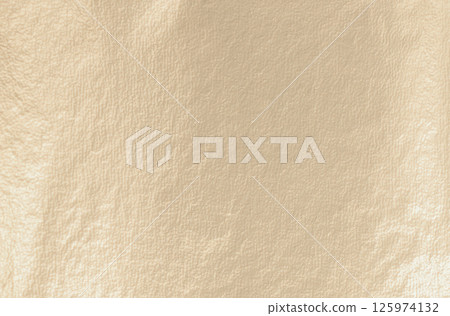 Gold leaf background with a smooth, matte texture. Soft gold, antique design with glistering gold 125974132