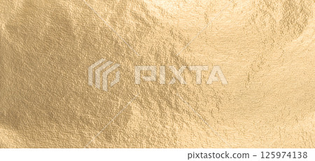 Gold metallic foil background with a smooth, shiny surface. Elegant, refined design in warm yellow 125974138