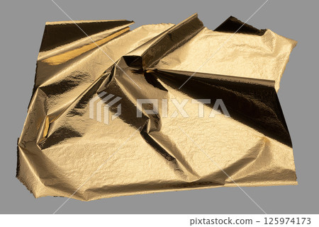 Golden foil sheet with reflective, shiny folds creating an opulent, modern design. Radiant gold leaf 125974173