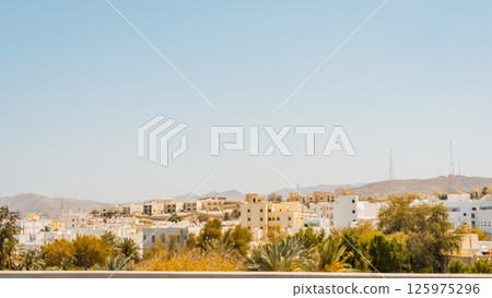 A picture of the city of Muttrah in the Sultanate of Oman, which features two historic castles from ancient times A picture of the city of Muttrah in the Sultanate of Oman, which features two historic castles from ancient times 125975296