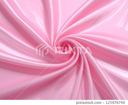 Swirled pink satin fabric background 125976740