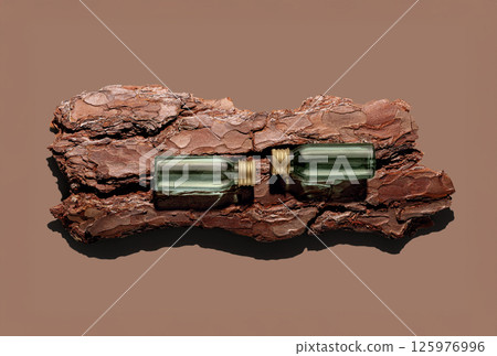 Unique art piece combining natural wood and vintage glass bottles on a simple background for decorative display 125976996