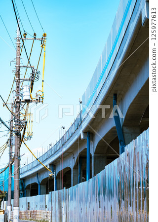 Railway viaduct and electric wire protection pipe under construction, Higashimurayama Station area, Tokyo, April 2025, c-4, light color 125977613
