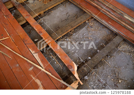 The house is undergoing renovation work to replace the old wooden floors The house is undergoing renovation work to replace the old wooden floors 125978188
