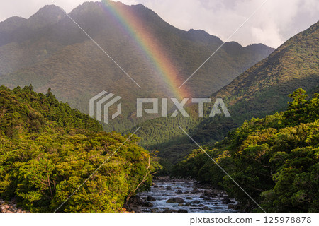 A beautiful rainbow over the Yakushima Offshore Alps (August) A beautiful rainbow over the Yakushima Offshore Alps (August) 125978878