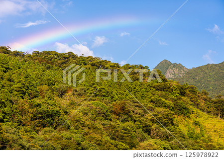 A beautiful rainbow over the Yakushima Offshore Alps (August) A beautiful rainbow over the Yakushima Offshore Alps (August) 125978922