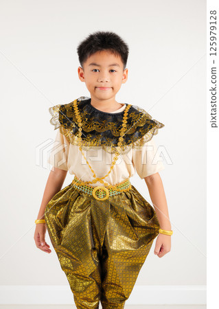 Portrait of Thailand kid boy smiling traditional Thai dress costume in studio shot isolated white background, Happy Portrait primary little Portrait of Thailand kid boy smiling traditional Thai dress costume in studio shot isolated white background, Happy Portrait primary little 125979128