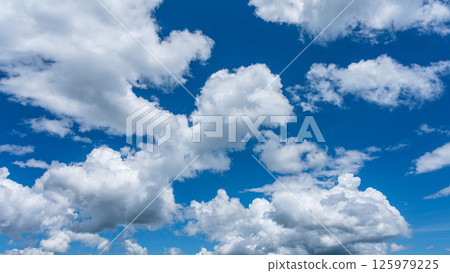 Summer refreshing blue sky and white cumulus clouds 125979225