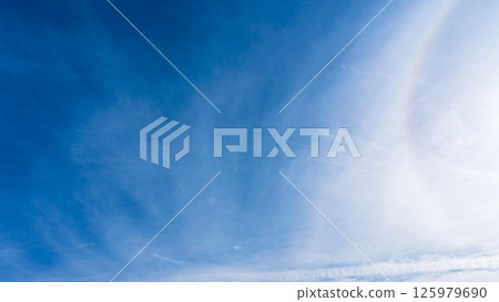 The "Halo Phenomenon" is a mysterious halo of thin clouds and the sun in a clear blue sky. The "Halo Phenomenon" is a mysterious halo of thin clouds and the sun in a clear blue sky. 125979690