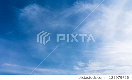 The "Halo Phenomenon" is a mysterious halo of thin clouds and the sun in a clear blue sky. The "Halo Phenomenon" is a mysterious halo of thin clouds and the sun in a clear blue sky. 125979736