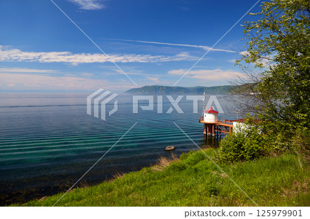 Lake Baikal on a summer day. Listvyanka village. 125979901