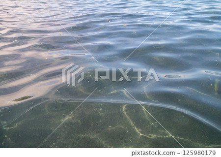 Swaying sea surface Swaying sea surface 125980179