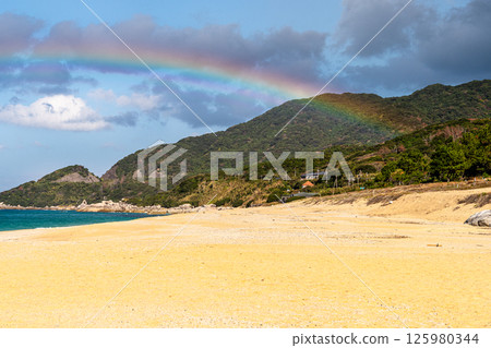 A beautiful rainbow over Nagata Inakahama Beach, a sea turtle nesting site on Yakushima Island (December) A beautiful rainbow over Nagata Inakahama Beach, a sea turtle nesting site on Yakushima Island (December) 125980344
