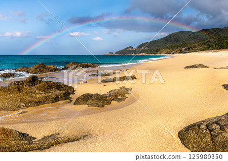 A beautiful rainbow over Nagata Inakahama Beach, a sea turtle nesting site on Yakushima Island (December) A beautiful rainbow over Nagata Inakahama Beach, a sea turtle nesting site on Yakushima Island (December) 125980350