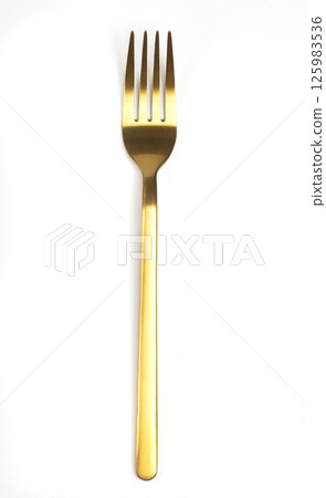 golden fork isolated on white background golden fork isolated on white background 125983536