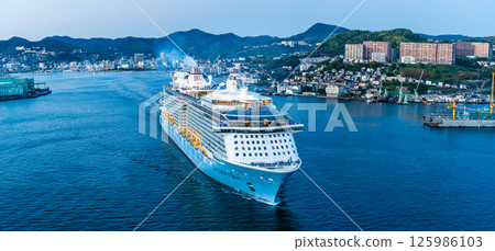 Cruise ship departing from Nagasaki Port (Spectrum of the Seas) Evening view from Megami Ohashi Bridge Panorama [Nagasaki City] 125986103