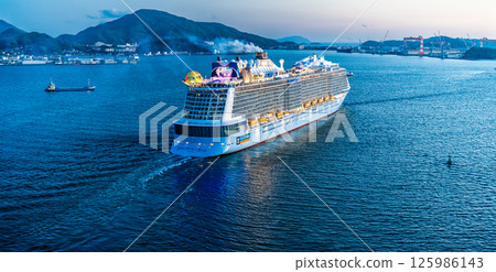 Cruise ship departing from Nagasaki Port (Spectrum of the Seas) Evening view from Megami Ohashi Bridge Panorama [Nagasaki City] 125986143