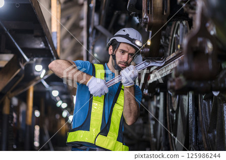 Engineer checking construction process railway and checking work on railroad station Engineer checking construction process railway and checking work on railroad station 125986244