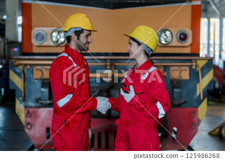 Engineer checking construction process railway and checking work on railroad station 125986268