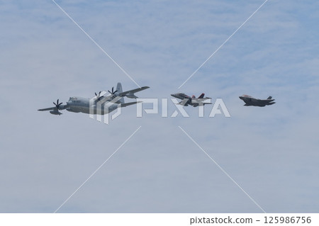 US Marine Corps KC-130J, F/A-18 and F-35 flying in formation at the Iwakuni Air Base Air Show US Marine Corps KC-130J, F/A-18 and F-35 flying in formation at the Iwakuni Air Base Air Show 125986756
