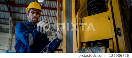 Engineer checking construction process railway and checking work on railroad station 125986866