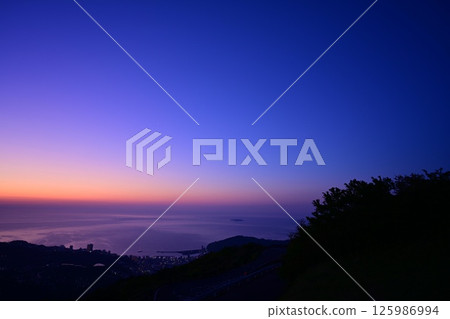 Sunrise seen from the top of the mountain. Sunrise seen from the top of the mountain. 125986994