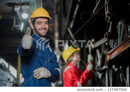Engineer checking construction process railway and checking work on railroad station Engineer checking construction process railway and checking work on railroad station 125987060