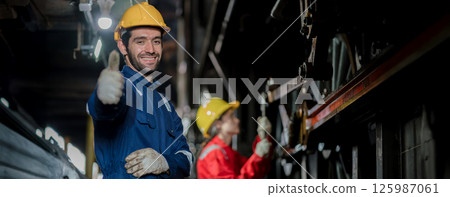 Engineer checking construction process railway and checking work on railroad station Engineer checking construction process railway and checking work on railroad station 125987061