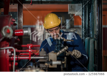 Engineer checking construction process railway and checking work on railroad station  125987066