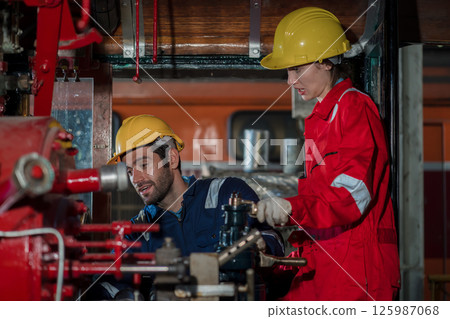 Engineer checking construction process railway and checking work on railroad station  125987068