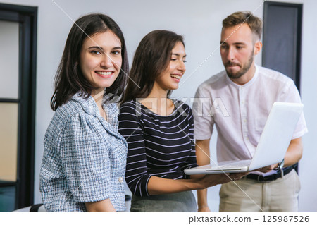 Businessmans crew working with new startup project in modern Office. 125987526