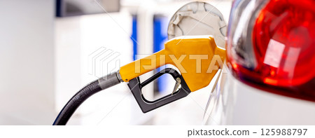 Refill and filling Oil Gas Fuel at station. Gas station - refueling.  125988797