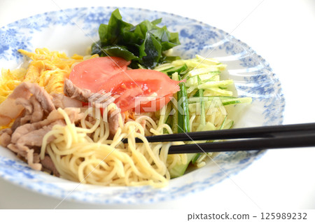 Chopsticks and cold Chinese noodles, home cooking Chopsticks and cold Chinese noodles, home cooking 125989232