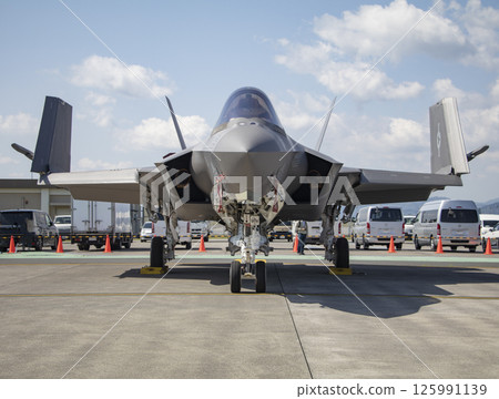 A carrier-based aircraft with its wings folded A carrier-based aircraft with its wings folded 125991139