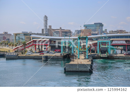 March 23 2025 Modern Harborfront View with Buildings and Waterfront Facility, Japan March 23 2025 Modern Harborfront View with Buildings and Waterfront Facility, Japan 125994162