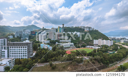 View of a University Campus with Lush Nature and Architecture May 4 2025 125994170