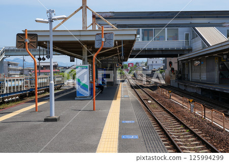 The Gomen Station and trains near where Takashi Yanase spent his childhood 125994299