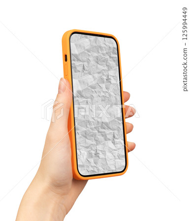 Hand holding a smartphone with an orange phone case, displaying crumpled paper screen. technology 125994449