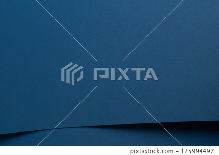 Blue paper texture with rich cobalt and deep ocean blue tones, smooth surface with geometric lines 125994497