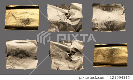 Torn and crumpled foil with metallic texture, rugged edges and fine glitter, golden and bronze tones Torn and crumpled foil with metallic texture, rugged edges and fine glitter, golden and bronze tones 125994515
