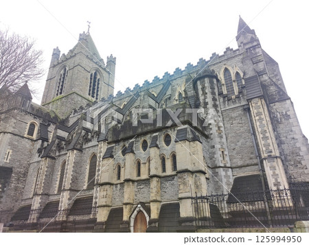 Old Irish castle in fog background 125994950