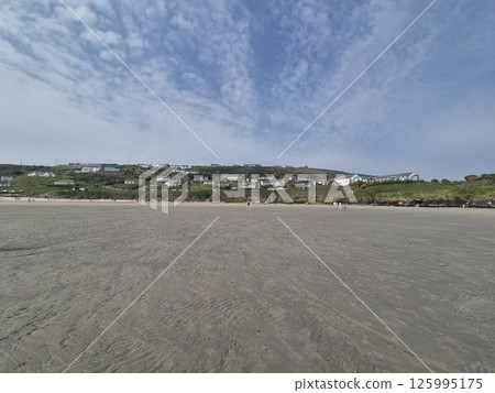 Coastal Road Landscape Under Cumulus Clouds 125995175