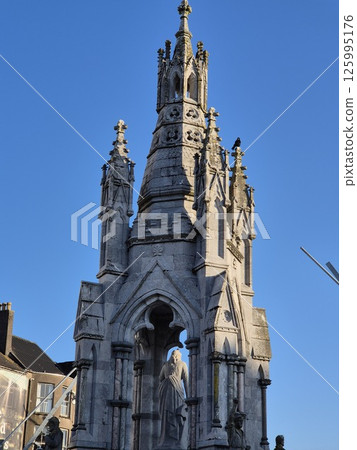 Sky Temple Tower in City Landscape 125995176