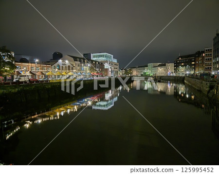 Urban Building Reflected in Lake with Sky and Cityscape Urban Building Reflected in Lake with Sky and Cityscape 125995452