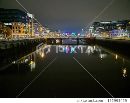 Cityscape at Dusk with Waterway and Bridge Cityscape at Dusk with Waterway and Bridge 125995459