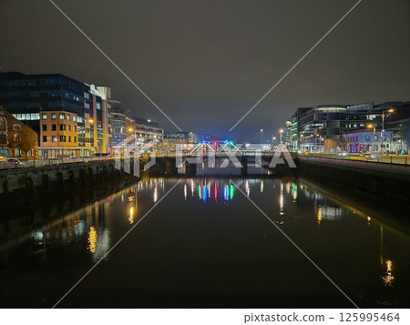 Cityscape at Dusk with Tower Blocks and Bridge Over Lake Cityscape at Dusk with Tower Blocks and Bridge Over Lake 125995464
