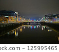 Cityscape at Dusk with Water, Sky, and Tower Block Reflections 125995465