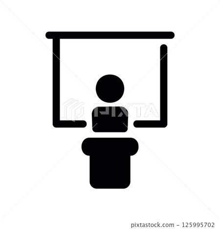 Speaker Standing at a Lectern Addressing Audience from Center Stage 125995702