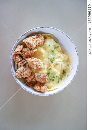 creamy omelet or omelet or omelette or fried egg with fried chicken or crispy chicken or chicken 125996119